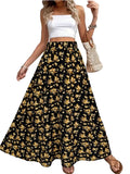 Woman wearing a white top and black floral skirt with a plant and woven bag in the background.
