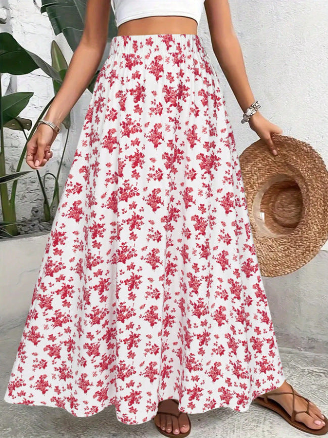 Person wearing a white floral skirt holding a straw hat against a white background