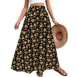 Woman wearing a black floral skirt with a straw hat on a white background