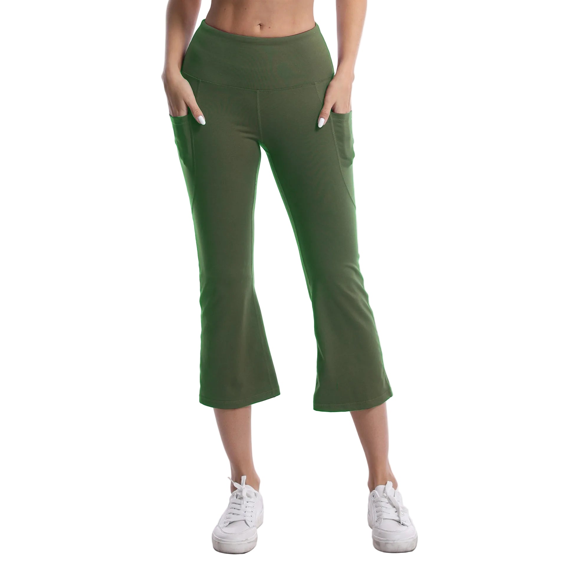 Green capri pants worn by a person on a white background