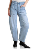Light blue jeans worn by a person on a white background