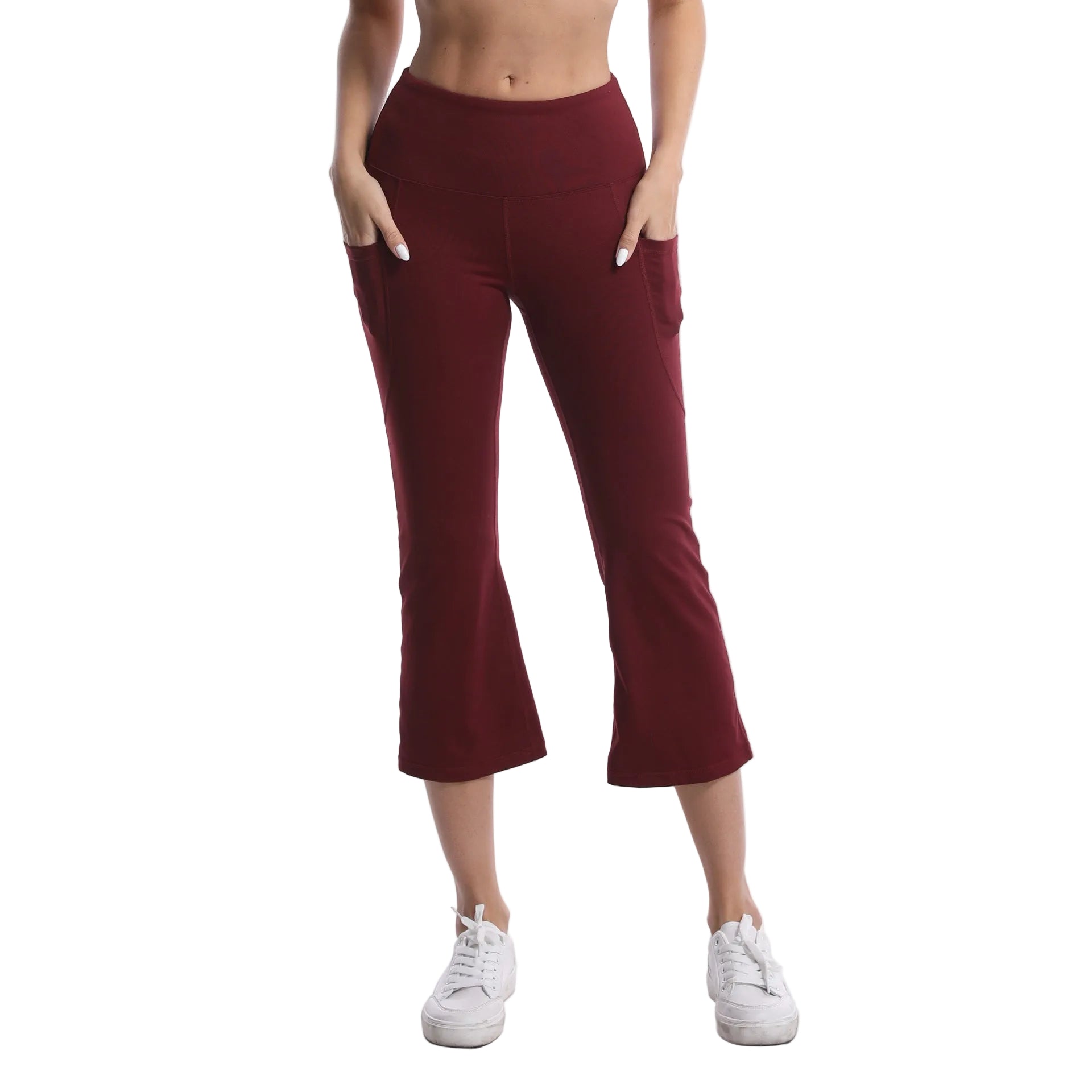 Maroon capri pants worn by a person on a white background