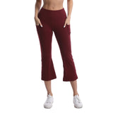 Maroon capri pants worn by a person on a white background