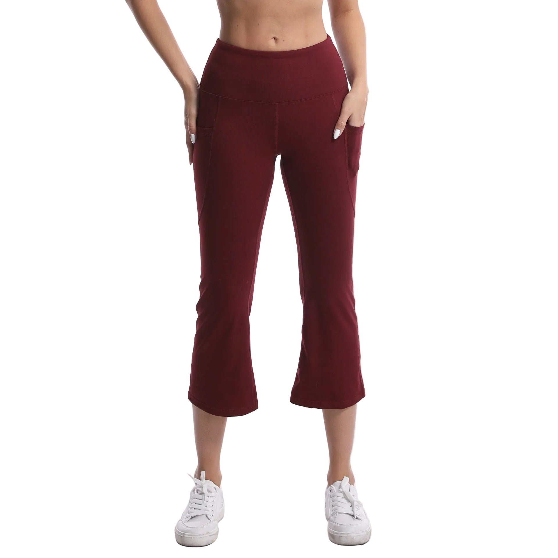 Maroon capri pants worn by a person on a white background