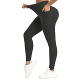 Person wearing black leggings on a white background