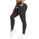 Person wearing black leggings with a pocket on a white background