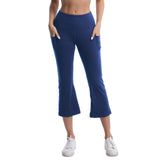 Person wearing blue capri pants on a white background