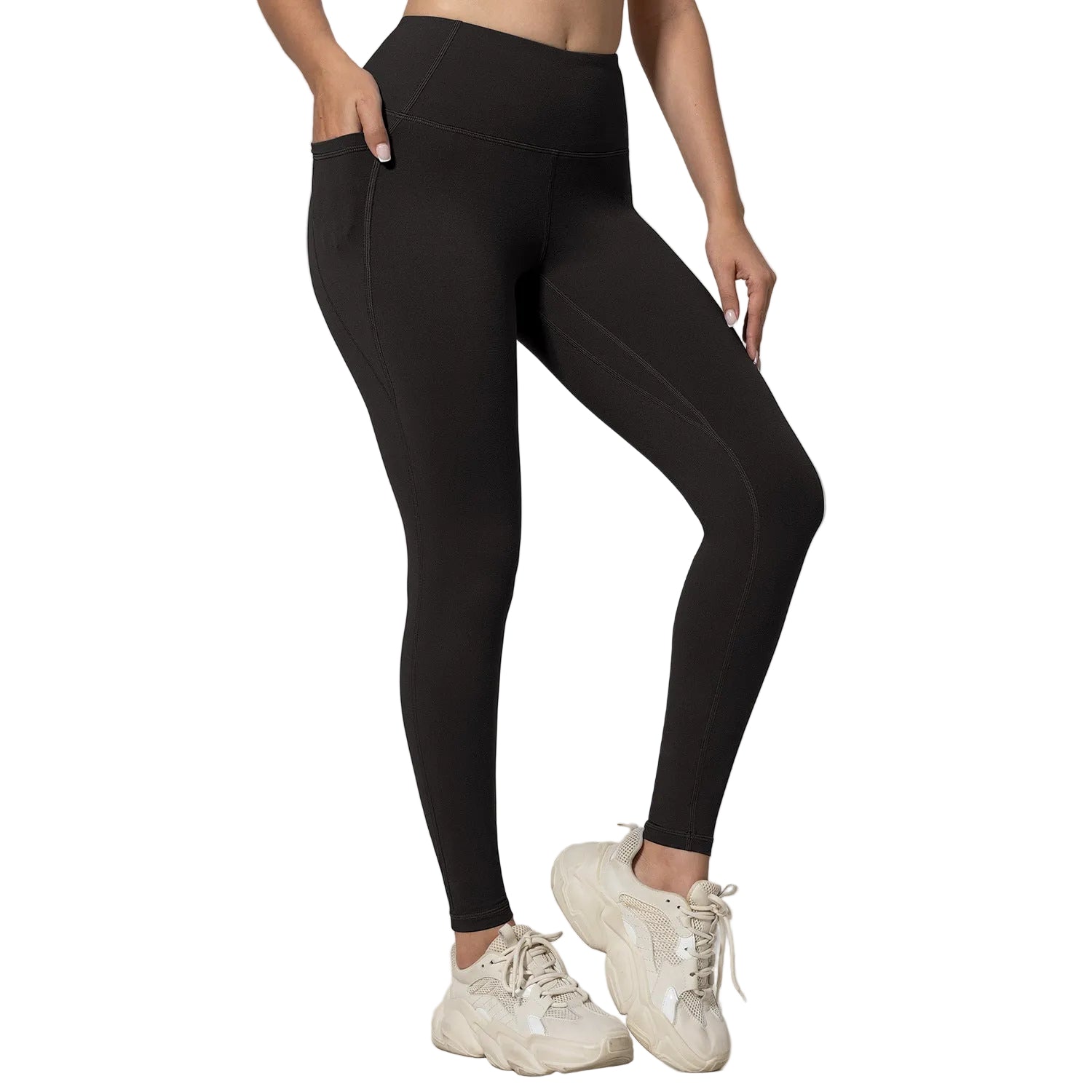 Person wearing olive green leggings and white sneakers on a light gray background