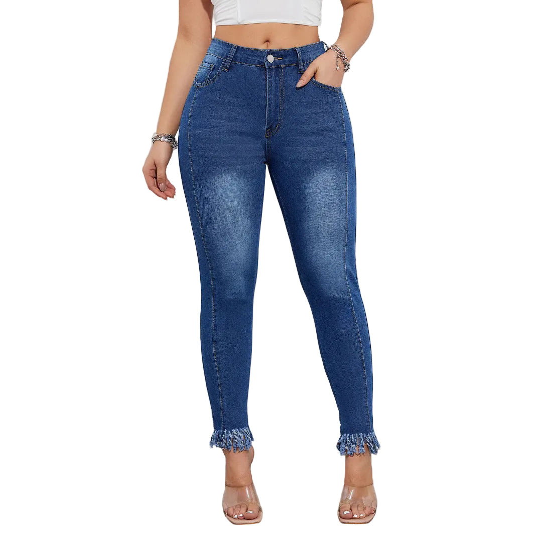 Person wearing blue jeans with a white background