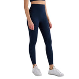 Person wearing navy leggings with a white background and 'T-Line Sports Edition' label.