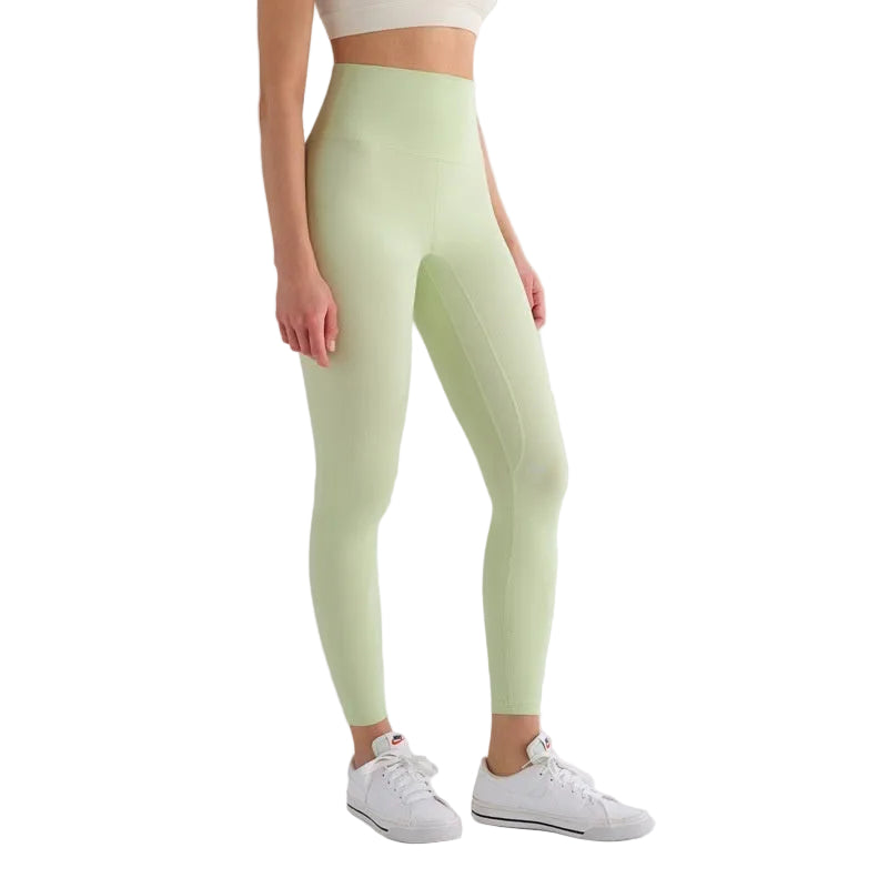 Light green leggings worn by a person on a white background with 'T-Line Sports Edition' label.