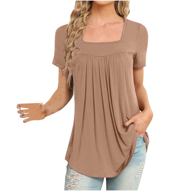 Woman wearing a brown short-sleeve top with a square neckline on a white background