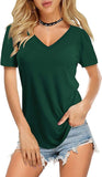 Woman wearing a green t-shirt and denim shorts on a white background