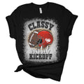 Black t-shirt with football helmet and ball graphic and text 'Classy until kickoff' on a white background