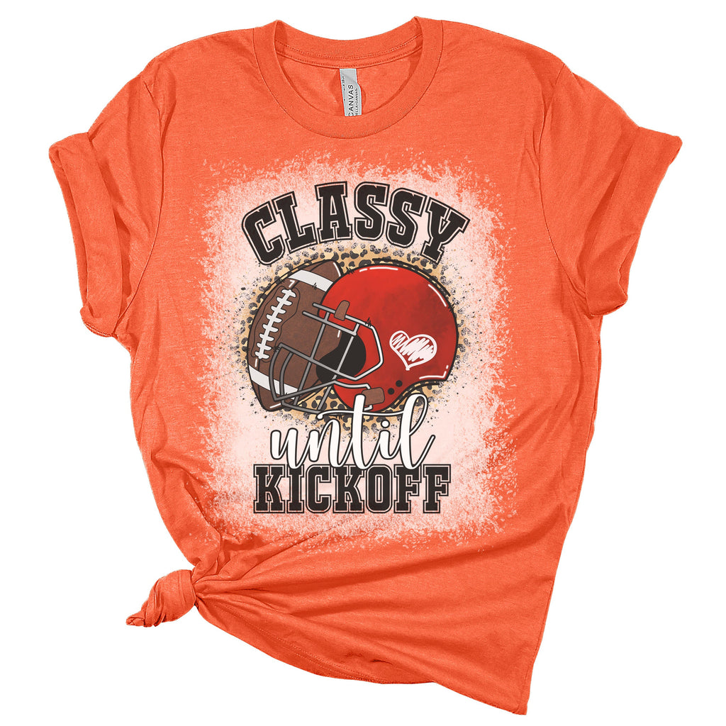 Orange t-shirt with football graphic and text on a white background