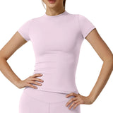Person wearing a light pink athletic outfit on a plain background