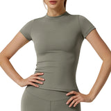 Person wearing a green athletic outfit on a plain background