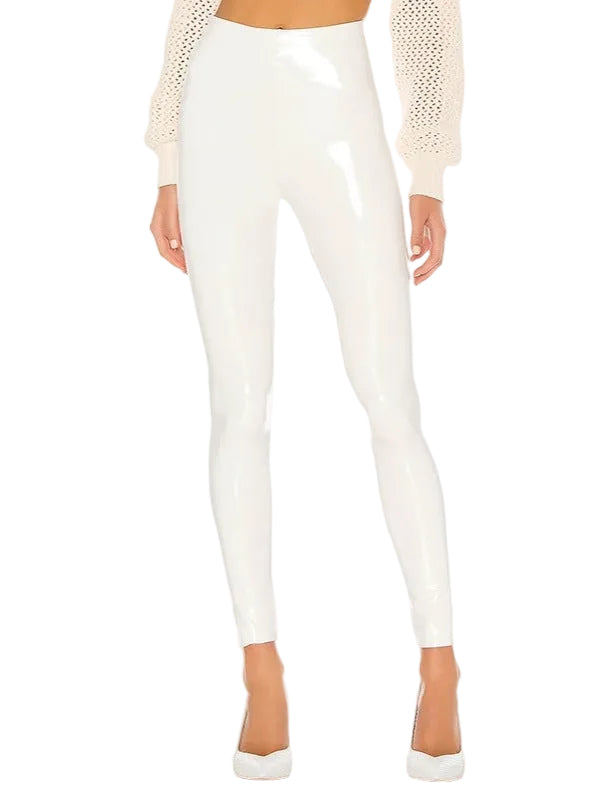White leggings worn by a person on a white background